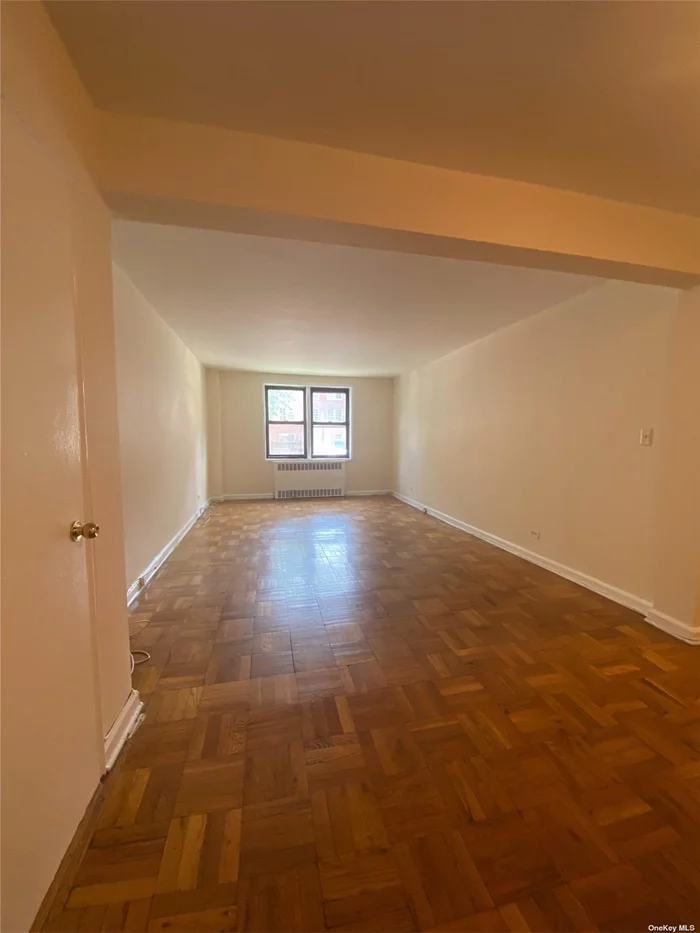 A spacious and beautifully designed 2 bedroom apartment in the prestigious Forest Hills section of Queens. Allow yourself to be captivated by the charming ambiance of this stylish 2 bedroom home with eat in kitchen and hardwood floors that truly makes this hidden jem one of a kind. Only a short walk to train and steps to bus stop. Seller motivated!!!
