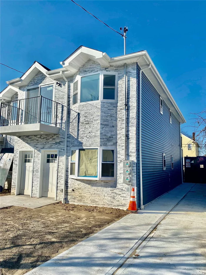 Brand new construction. Semi-detached legal 2 Family House located close to public transportation. Less than a 5 minute walk to the LIRR station. 2 bedroom apartment over a 2 bedroom apartment plus a large basement with a separate entrance. Private driveway and backyard.