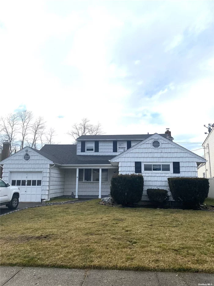 This house is the Essence of Serenity & Comfort. Twelve Rooms, 5 over 7. 5BR / 2 full bath dormered N. Bellmore ranch w/ 2, 147 living area. 1st Fl - 3BR, Full Bath, LR, DR, , Kitchenette, Laundry. Plus, a unique to the area 12&rsquo;x24&rsquo; den w/ plenty of window light and wood burning stove. Includes sliders to backyard deck & yard. All common area floors are easy clean waterproof wood grain laminate. Yard wrapped by 6&rsquo; PVC fence w/ 2 extra wide gates. 2nd Fl - Space for Mom w/ LR, 2BR, Full Bath & WIC. Includes access to its own yard parcel. Has 2 entrances with separate and common access for easy entrance, exit, visit. The fully finished basement is footprint of foundation w/ 3rd living area, exercise room, office & surplus of storage including cedar closet. Double Driveway w/ 4 full spaces leading to attached garage with direct interior access. In ground sprinklers front, sides, & yard. Fully updated roof, gas heat w/ newish burner and h/w Heater. Near to shopping, grammar school and parkways. Bring Mom-M/D by permit (apartment freshly painted and brand new carpeting).