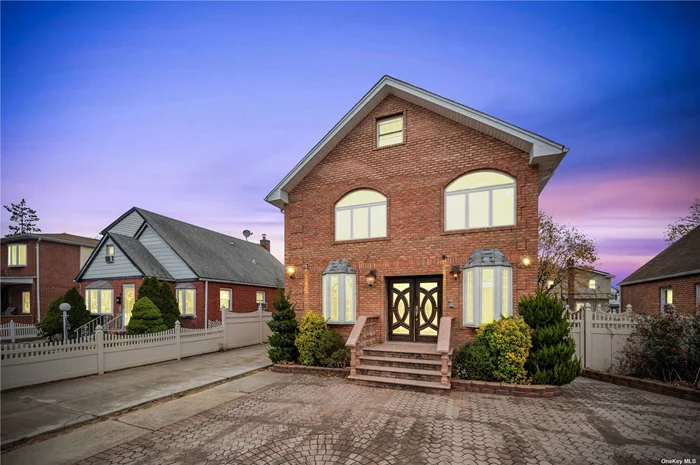 Immerse yourself in the enchantment of this Mesmerizing Colonial House in Cambria Heights! This truly Unique residence extends a warm welcome with an Open Concept Living Room and Dining Room, fostering a seamless flow of space. The Kitchen, adorned with appliances and soft-closed cabinets, introduces a touch of modern functionality. Discover unparalleled comfort and luxury in the 5 Beautiful Bedrooms, featuring a Lavish Master Bedroom, all complemented by 3.5 Baths. The Full Finished Basement with an Outside Separate Entrance adds an extra layer of versatility to the home. Efficiency meets style in the kitchen with Gas for cooking. Revel in the convenience of Private Parking, a Driveway with a 2 two-car garage, and additional street parking. Step into the expansive and lush backyard, a verdant haven for quality time with friends and family. Strategically located close to Schools, Buses, Parks, and other amenities, this residence ensures a well-connected and vibrant lifestyle. Don&rsquo;t let the opportunity slip by! This might be your next Dream Home. Explore the charm and potential of this unique Colonial House.