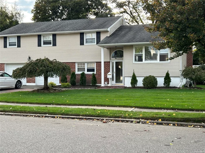 Expanded split features 5 bedrooms, 2 ? baths, 2 car garage, gas cooking and heat (4 month old boiler) CAC, front and rear yard IG Sprinklers, exterior gas hook-up with generator, instantaneous hot water heater (5 years old), 200 amp electric service (4 years old), 40-year architectural roof (20 years old), new kitchen 2012, vaulted ceilings with lofts in 3 bedrooms, vaulted ceilings with skylights in the bathrooms and kitchen, LG washer/dryer (5 years old), House has all CO&rsquo;s. Fenced yard with deck and shed. Lot size 81 x 124