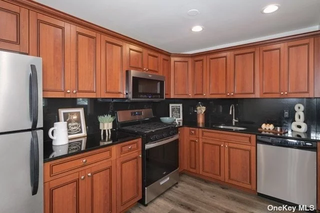 Spacious, Private Entry 1&2 Br. New Eat-In-Kitchen W/Raised Panel Cabinetry & Dining Area. Ceramic Tile Bath. Lovely Residential, Park-Like Setting.On-Site Laundry Center. Walk Lirr & Local Shops. Conv To Sunrise Hwy & Southern State Pkwy. Prices/Polices Subject To Change without notice.