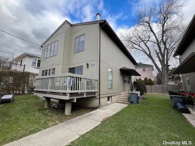 Quiet, Rear 2 Bedroom Apartment w/Outdoor Deck and Small Yard. Living Room w/FP, Dining Area, Kitchen, 2 Bedrooms w/Own Bath. Hardwood Floors, Unfinished Basement w/Laundry. Close to Manorhaven Community Park and Shopping. Landlord Will Consider Pet With Additional Rent.