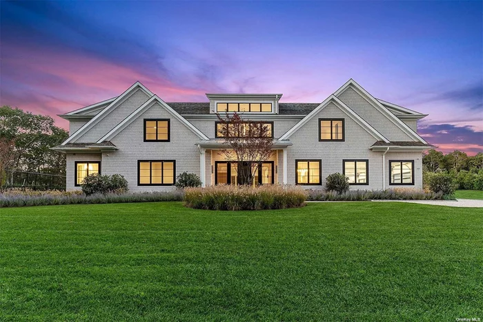 Sitting on nearly 5 private acres, this new construction is a classically-inspired masterpiece with farm views. The home, spanning 8 bedrooms and 10 full bathrooms, contains 9, 460 +/- square feet of living space, including a 2, 550 +/- square foot finished lower level. This home is the pinnacle of luxury, tucked away amid the farmsteads of Water Mill, yet conveniently located moments from the world&rsquo;s most sought after beaches, dining and leisure. Upon entering the residence, an entry gate with a long tree-lined driveway greets guests and homeowners. On the first level, the house has a natural bridge between the interior and exterior with the kitchen, breakfast room, living room and junior bedroom connected to a large outdoor patio. On the second level, there is a grand primary suite and 4 additional en suite bedrooms, each with custom walk-in closets, tray ceilings and well-appointed bathrooms. The finished lower level has a media room, recreation area, sauna, gym, third laundry room and 2 additional en suite bedrooms. Exterior amenities include a 20&rsquo; x 50&rsquo; heated gunite pool with auto cover with spa, pool house and Har-Tru tennis court.