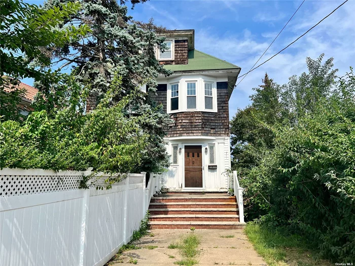 Great opportunity to build the home of your dreams. This 2, 700 Sqft colonial home needs TLC. This home is nestled in a 5, 370 Sqft lot in a very quiet block of the highly sought after neighborhood of Bay Terrace, close to Bay Terrace Mall, parks, public transportation, and major highways