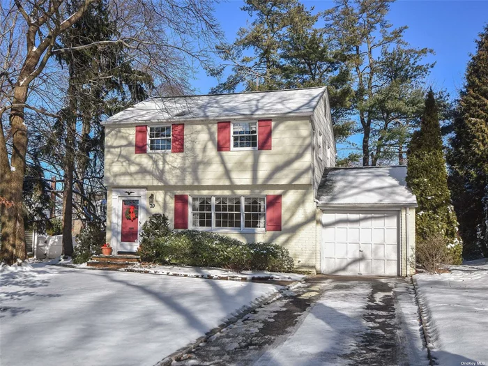 This delightful Salem home is situated on a beautiful tree-lined street and has been lovingly updated and maintained. Entry foyer with coat closet opens to living room with southern exposure and dining room. The eat-in kitchen boasts gas range, refrigerator, and dishwasher with built-in pantry storage. Just steps away is the charming den with bow window and sliding doors to patio and the very lovely private yard. A powder room completes the first floor. Second floor features 3 bedrooms and bath. Full basement with laundry. Hardwood floors throughout, gas heat, attached garage, roof approximately 5 years old. Taxes have been grieved.