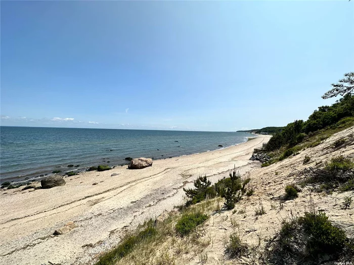 Build your dream home on the private lot. A beautiful beach community with beach access. Elevated lot will allow limited water views from the second floor. Priced to sell won&rsquo;t last long.
