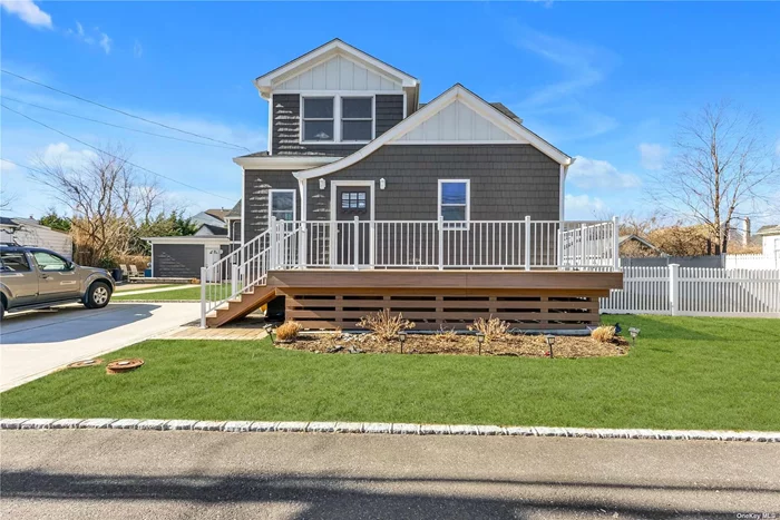 This home features an open floor plan with a spacious living room, a modern eat-in-kitchen, four bedrooms, two full baths, vaulted ceilings, and a sizable basement for storage with a washer and dryer. Parking and yard also. Conveniently located, it&rsquo;s just a stone&rsquo;s throw away from the beach, playground, and restaurants.