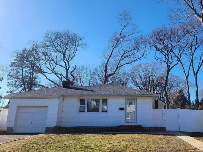Beautifully Renovated 3 Bedroom Ranch in the Presidential Section of West Islip! High Ceilings, Hardwood Floors Throughout, New EIK with Large Island, Stainless Steel Appliances, Living Room w/ Fireplace, Open Floor Plan is Great For Entertaining! New Windows, Huge Full Finished Basement, New Heating and CAC System, PVC Fully Fenced! Coming Soon and Will Not Last!