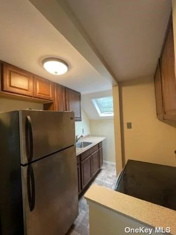 Private Second Floor One Bedroom Apartment WITH Laundry! Pets OK. Separate Meter for Utilities Paid By Tenant, Kitchen with Walk In Pantry, Large Primary Bedroom with 2 Closets, New Carpets and Flooring, Close to Shopping, Dining and RR