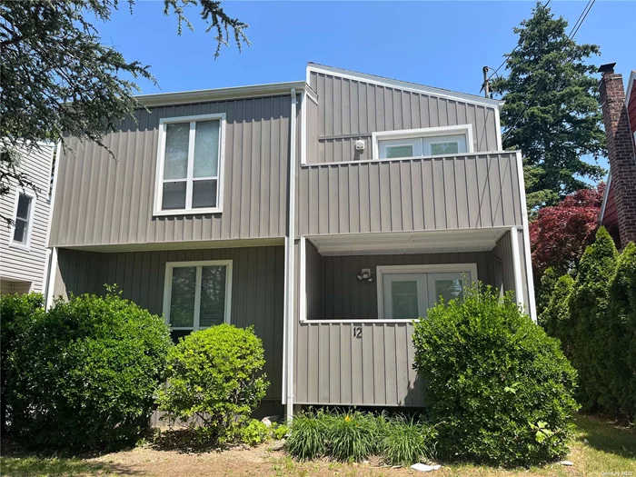 Bright and sunny duplex includes 2 bedroom, 2.5 baths, hardwood floors, and modern eat-in kitchen w/balcony. Basement with washer/dryer and storage. CAC. Off-street parking.