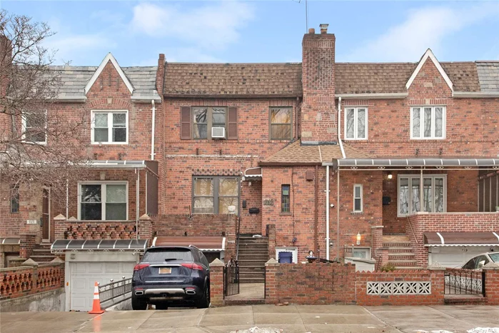 Welcome to this legal 2 family brick house located on a desirable block in Dyker heights . This home has a total of three levels; the walk in and first floor create a duplex apartment, while the second floor is a separate apartment. It also offers a private driveway and garage, so there is parking for two cars offering convenience to the homeowner.The lower level of the duplex apartment has 2 large rooms, a kitchen and a full bathroom and access to the covered private back yard. The upper level of the duplex apartment has 3 bedrooms.The second apartment on the 3rd level of this house is an apartment with 2 rooms, a kitchen and a full bathroom. The location of this house provides easy access to the 278 expressway, and is a short distance to the subway.and to the markets, restaurants and shopping on Eighth Avenue. The house is also surrounded by a beautiful park, playground, tennis courts,  soccer and ball fields. Maimonides hospital is also nearby. Both units are presently occupied.
