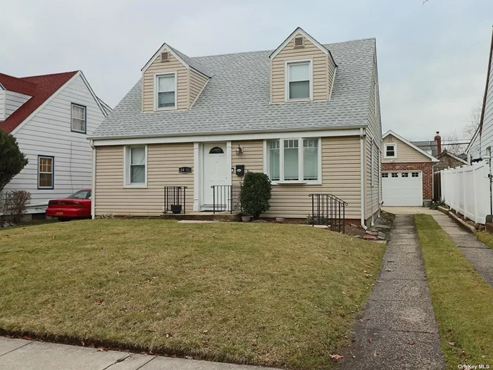 Center entry, suburban style, Wide-Line cape. L/R, D/R,  First floor MBR, Eat- In Kitchen with Pella slider to backyard, full bath, 2nd fl. another MBR, Br, up-dated full bath with stall shower. 3/4 finished basement, Dry professional waterproofed, separate H/W baseboard zone for heat, L-O-N-G Pvt. driveway with 1.5 car garage. An absolutely great place to live. New roof and siding 5 years old. A Must See!