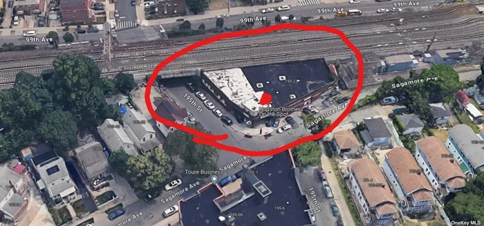 Large property for investor or builder. R5, Adjacent to LIRR station. Very large footprint with lots of possibilities.
