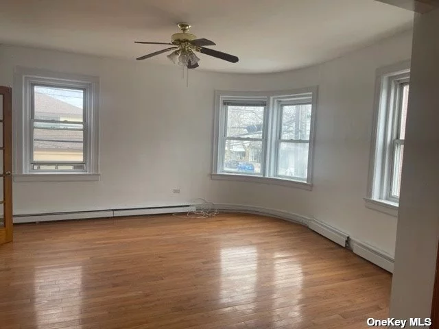 Fabulous Babylon Village Apartment on 2nd Floor with Plenty of Large Windows Overlooking the Village, Close to ALL! Beautiful Hardwood Floors Throughout, Great Size Bedroom and Living Rm with French Doors, Extra Storage Closet, and 2 Entry Doors.
