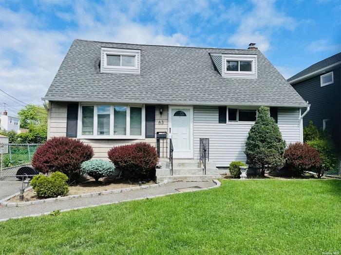 Expanded Cape W 4 Bedrooms, 2 Updated Baths And Updated Kitchen W/ Granite Counters, Gas Cooking & Heat, Gleaming Hardwood Floors, Hi-Hats, New AC Unit, Finished Basement, Washer/Dryer, Lots Of Storage, Private Yard, 1 Car Garage, Mid Block. Close To All!!!