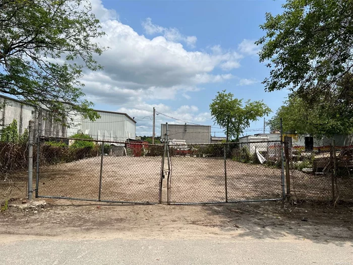 50&rsquo; x 90&rsquo; Fenced Industrial Lot for Storage with 22&rsquo; Gate Opening. Cleared and Level. No Work Permitted - Only Storage.