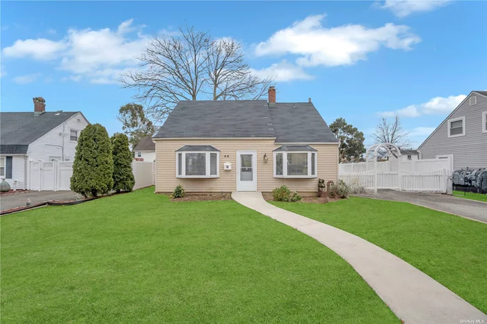 Step into this enchanting expanded cape residence situated on a charming mid-block street in the heart of Levittown. Explore the potential mother-daughter layout with proper permits. The home boasts an inviting open concept, with a spacious living room, and formal dining room featuring new flooring and sliders to the deck. The eat-in kitchen is adorned with brand new stainless steel appliances, including a refrigerator and microwave, along with soft-close cabinets. With four bedrooms, including a generously sized master bedroom with double doored closets, and two full bathrooms on each level, this home offers comfort and space. Hardwood flooring, high hats, and a long private driveway add to its allure. Imagine hosting gatherings in the fantastic side and back yards, complete with a shed, deck, and a PVC fence surrounding the property. The location is superb, right next to Hempstead Turnpike, with amenities such as Levittown Public Library, Community Pool, Neighborhood Park, restaurants, shopping, and more just across the street. A brand new roof was installed in 2023, and the reasonable taxes make this home a sound investment. Don&rsquo;t miss the chance to witness the beauty of this property and turn it into your dream home!