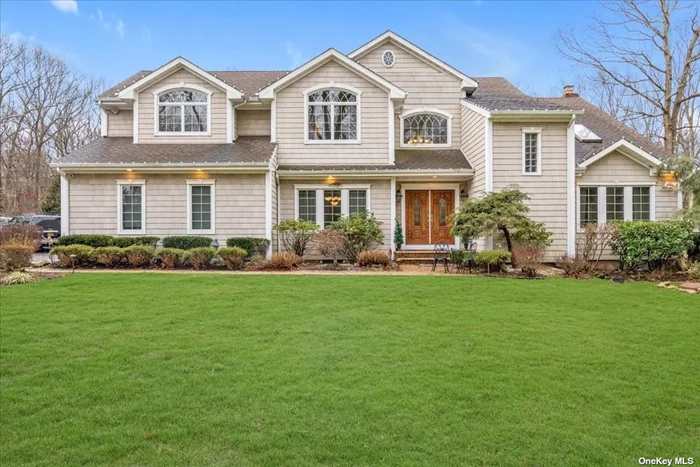 Luxurious Living. Colonial Style featuring seven Bedrooms and four bathrooms. Desirable Half Hollow Schools. Gorgeous Inground pool. Lawn Sprinklers. Room for basketball court on one level acre. Private fenced. Manicure backyard perfect for entertaining or relaxing.