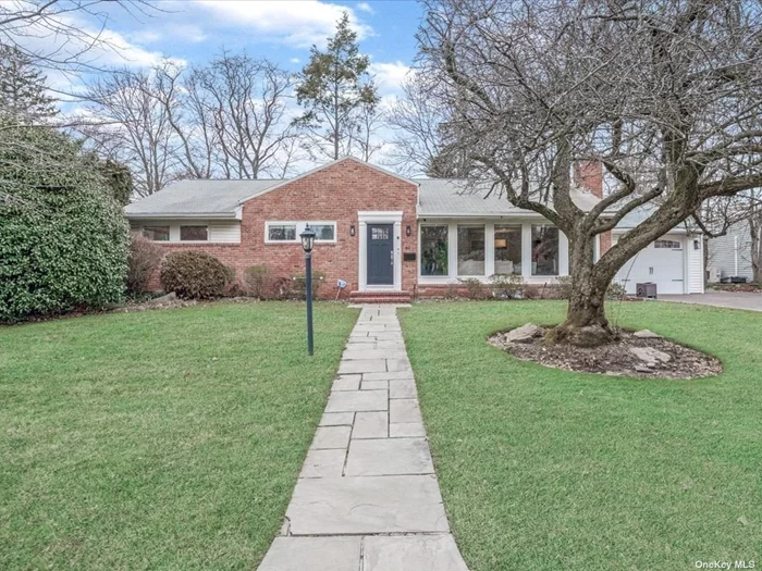 This modern, single-level home boasts an open floor plan, 3 bedrooms, 2 bathrooms, and abundant natural light. Situated on a spacious 10, 000 square foot private lot, it features hardwood floors, central AC, and a fireplace. The eat in kitchen with marble counters and an eat-in area overlooks the spacious, lush yard. With a home office, formal dining room, and attached garage, this residence offers effortless, modern living. Walking distance to private East Hills pool complex. Don&rsquo;t miss out on this gem!