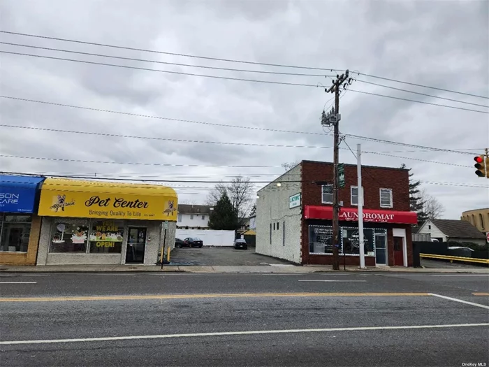 Long Island, Heart of Albertson, from LIE exit 36, Mixed use properties w/three units of 3000 sf retail space; 20 parking spaces on two adjacent lots of over 10000sf; possibility for building another in between; current cap rate above 4 percent, great growth and appreciation potential.