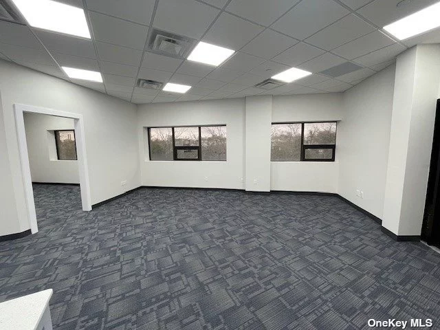 ABSOLUTELY BEAUTIFUL COMPLETELY GUT RENOVATED HIGH END CORNER OFFICE SUITE. LARGE OPEN AREA AND SEPERATE EXECUTIVE OFFICE WILL ACCOMODATE A WIDE ARRAY OF DIFFERENT TYPE BUSSINESSES. WINDOWS GALORE LET THE SUN SHINE IN AS WELL AS A MAJESTIC VIEW OF MANHATTAN, A PRIVATE BATH AND KITCHENETTE AREA PROVIDE ALL THE COMFORTS OF HOME. NEW CARPET, PAINT, CAC, LIGHTING AND IN WALL CABLE WIRING MAKE IT READY TO MOVE RIGHT IN, THE BUILDING ITSELF IS BEAUTIFULLY MAINTAINED AND PERFECTLY POSITIONED RIGHT OFF THE LIE WITH EASY ACCESS TO ALL FIVE BOROUGHS AND LONG ISLAND. PROFESSIONAL CLEANING SERVICE IS INCLUDED IN THE RENT. ONE PARKING SPOT IS AVAILABLE FOR AN ADDITIONAL $200 PER MONTH. ONE BLOCK TO GRAND AVE WITH ALL ITS DINING AND TRANSPORTATION OPTIONS