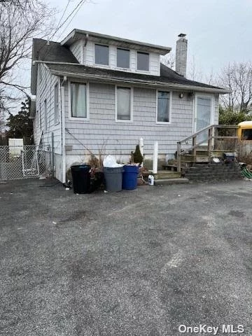 This Home needs TLC being sold AS IS- 100amps with sub panel box-Low Taxes, South of Montauk Hwy , Water view, Flood Ins. required , Roof approx. 22yrs - Gas boiler and hot water (50 gal) approx. 11 yrs. young -main floor laminate (pergo) no dishwasher but space for one- This is an opportunity to design your own decor and layout. 1924 retro home. close to bus and shopping.