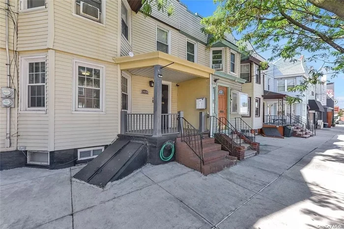This classic Two Family Home at 64-08 Metropolitan Avenue is perfect for investors or end users. It features two floor-through units with a finished basement and PARKING FOR 2 CARS. The top floor unit offers an eat-in-kitchen, stainless steel appliances, two bedrooms, a living room, and bonus room. The first-floor unit has a spacious living/dining room, a primary bedroom, and an interior room. Both kitchens have ample storage and modern appliances. The backyard has parking space and room for a BBQ. The house is in Middle Village & Ridgewood, offering easy access to transportation and amenities like Juniper Valley Park and trendy restaurants. Consider renting out one unit or owning the whole house. Come see the possibilities!