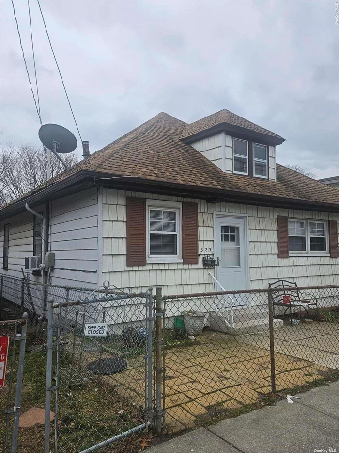 3 bed 1.5 bath house with walk up attic and full basement  House is located close to transportation and shopping with low Taxes