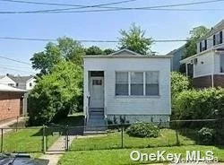 Cozy 1 BR Bungalow. Living Room, Eat-In-Kitchen, with Dishwasher, 1 Bathroom. Hardwood Floors Throughout. Full Finished Basement. Backyard.