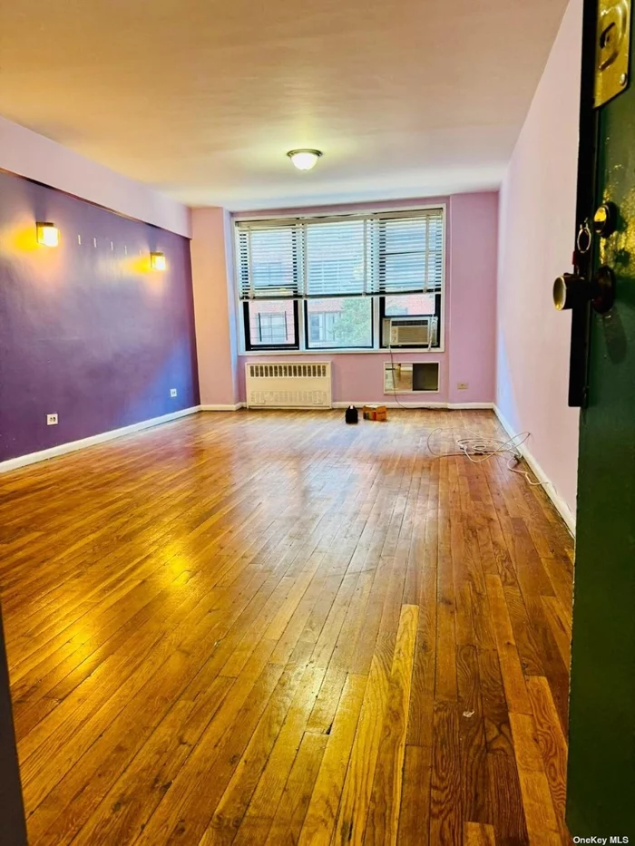 Large 1 Bedroom Apartment In Heart Of Elmhurst With Generous Kitchen, Spacious Living Room, Sizable Bedroom And Tons Of Storage. Elevator Building, Close to M/R /7 Subway Station, 30 Min Into City. Supermarkets, Library, Banks And Much More Just A Few Blocks Away. Subject To Board Approval.
