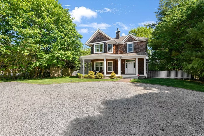 This ideally located farmhouse style home is a stone&rsquo;s throw from East Hampton&rsquo;s North Main Street, and just minutes from village ocean beaches. Enjoy nearby shopping, restaurants, and museums, as well as the convenience of having the Jitney and train station just a mile away. Set back from the road on a private half acre with mature landscaping, this welcoming retreat provides 3 bedrooms, 2.5 baths, a cozy living room with fireplace, and a large open kitchen/dining area with sliders to the back deck and pool.