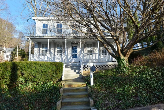 Step into this enchanting Roslyn Colonial, a piece of the past with 3 bedrooms and 1.5 bathrooms. Explore the charm of this lovely home, showcasing a recently renovated eat-in kitchen with new stainless appliances. The first level boasts a formal living room, formal dining room, and a convenient half bath. On the second floor, discover a primary bedroom along with 2 additional bedrooms and a full bath. The basement level offers two separate rooms and an external entrance for added convenience. Welcome to the timeless allure of this vintage residence.