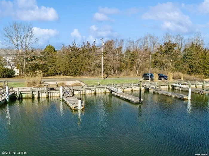 Jamesport Design and build your dream home on this shy acre property with 2 Boat slips on canal leading to Peconic Bay. Separate waterfront area for your jet ski, kayak or 24&rsquo; boat. Pretty area with lots to enjoy nearby including an organic farmstand, wineries, beaches, restaurants and overall quiet that the North Fork offers! Short distance to the Hamptons too or better yet Go by Boat!