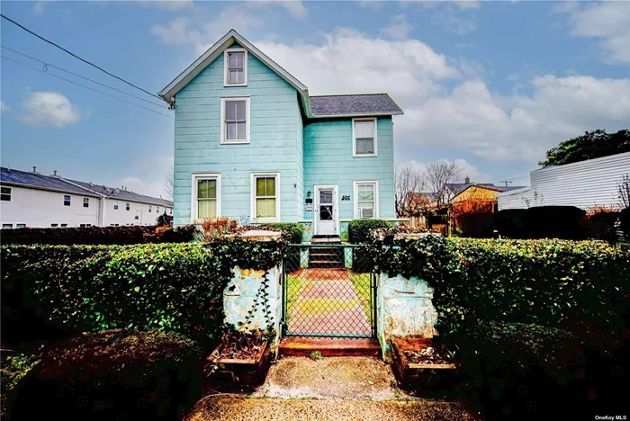 Nestled in the heart of Bay Shore, this enchanting colonial residence boasts timeless appeal. Built in 1910, it exudes charm and character at every turn. Step inside to discover a cozy living room, formal dining room, and a kitchen perfect for culinary adventures. With three bedrooms, two full baths, and a generous attic, there&rsquo;s ample space to personalize and make it your own. Outside, a detached two-car garage adds convenience. Located close to town amenities, the railroad, and fire Island ferries, this home offers both comfort and convenience. Bring your vision and creativity to unlock its full potential - your dream home awaits!