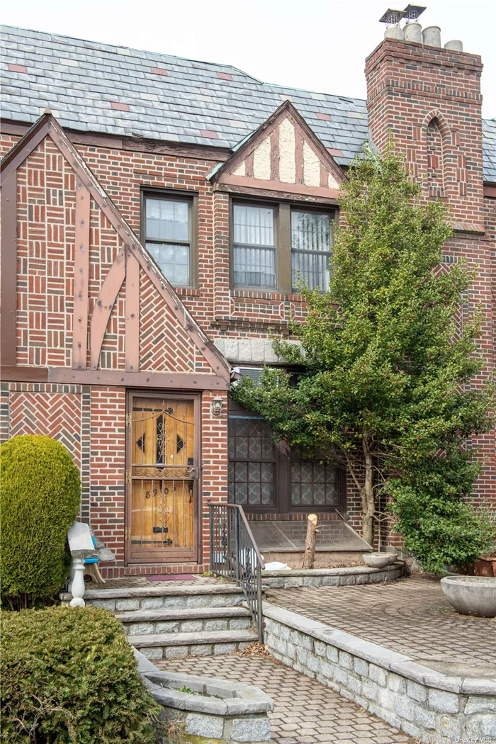 Fantastic income producing legal two family house located in wonderful Glendale, Queens. This great house comprises two separate units. The first floor and basement form a one-bedroom duplex that features a charming sitting room with a WBFP, a formal dining room ( or a second bedroom)an eat-in-kitchen, a full bath, an in-unit washer and dryer, and a large private terrace. Downstairs, there is a very large bedroom with a WBFP, a spacious Walk-in closet, and a separate entrance. Additionally, there is a private detached garage in the rear of the house. On the second floor, there is a floor-through one-bedroom with oversized rooms and a master bathroom featuring a separate shower stall and a soaking tub. The kitchen has a window and a washer and dryer. There is excellent storage space available in the unit. This fantastic property is easily accessible via public transportation on Woodhaven Blvd. Major nearby highways include The Jackie Robinson Parkway, and the Long Island Expressway. Its proximity to Manhattan makes this a highly desirable location. There are numerous shopping venues and wonderful dining options nearby, making it a wonderful find.