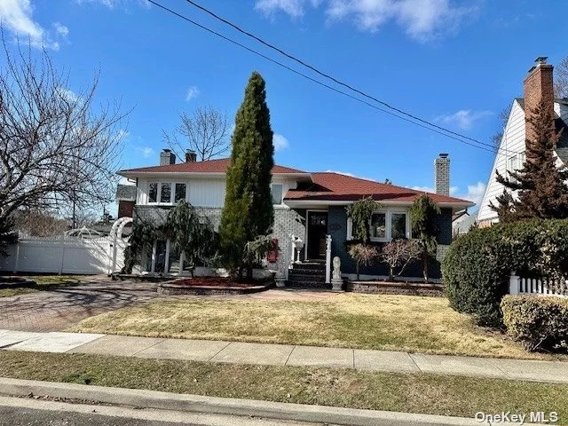 Renovated Split level home. 3 Bedrooms 2 Full Baths. Updated Kitchen and Baths. Wood Floors . Corner property with great outdoor space for entertaining.