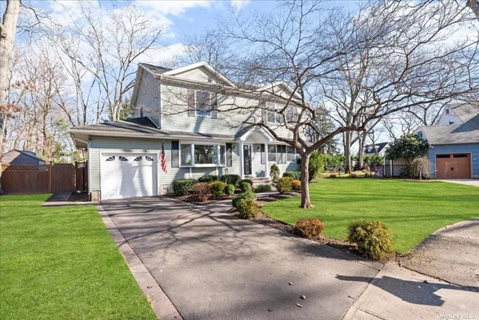 Turnkey Updated & Expanded Colonial situated in a cul-de-sac in Harborfields SD. The welcoming approach boasts recently installed brick pavers and covered portico. The 1st floor features updated Eat-in kitchen w/wood cabinets, gas cooking and pantry closet. The formal DR flows into a spacious great room perfect for entertaining. A newly installed sliding door leads to the spacious deck and fenced rear yard. The 1st FL bedroom/office is adjacent to a remodeled full Bath. The 2nd FL addition has a huge primary BR Suite w/full bath & walk-in closet. There are 2 generously sized Bedrooms and Full Hallway Bath. 1st & 2nd floors have hardwood floors. There is a partially finished large basement with OSE. Add&rsquo;l features are updated 3-zone gas heat & hot water heater, 200 Amp service, 2-zone CAC and attached 1-car garage