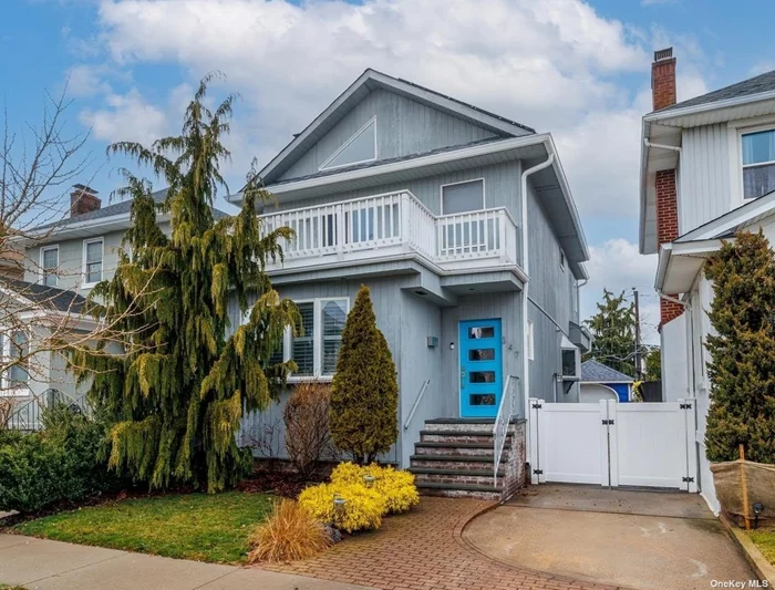 Long Beach Westholme Area - Beautifully Remodeled Colonial with high grade cedar siding + solar panels. This is One Cool House! Foyer leads you to open living room, formal dining room with French doors leading to private rear elevated deck - Deck which has fans & lights for fun summer nights! Fabulous Chef&rsquo;s kitchen with Corian countertops, marble backsplash, Sub-Zero fridge, a 36 Bertazzoni professional stove, plus additional family dining room. Half bath. 2nd floor features: 3 bedrooms - Primary bedroom has vaulted ceiling with private balcony, unbelievable walk-in custom closet with LED lighting, en suite marble bath with walk-in shower, double sinks and wall hung Duravit toilet - plus 2 charming bedrooms with vaulted ceilings & additional full bath. Central Air Conditioning. Laundry room with Bosch washer/dryer and Bonus spaces in the basement. Home has a lovely backyard that is completed by the addition of a Pergola. Private driveway + detached 1 car garage. Beautiful hardwood floors throughout. Modern touches. Immaculate! You Will Fall in Love!