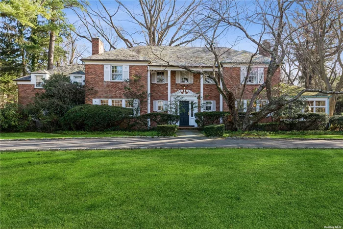 This gracious Georgian Center Hall Colonial welcomes you, your family and friends every day. Embrace the elegance and warm ambiance of this lovingly maintained 1938 home, perfectly placed on this 1.1 flat acre of mature horticulture, lawn and rose garden. Upon entering the circular drive and the classic front doorway; you feel personally invited by taking note of the generously sized living rooms and the quality workmanship as seen in the gleaming original oak floors. Located in Sands Point with beach rights and a close proximity to Manhattan offers the best in Town and Country living. Make this your Forever Home with your plans and dreams to come true.