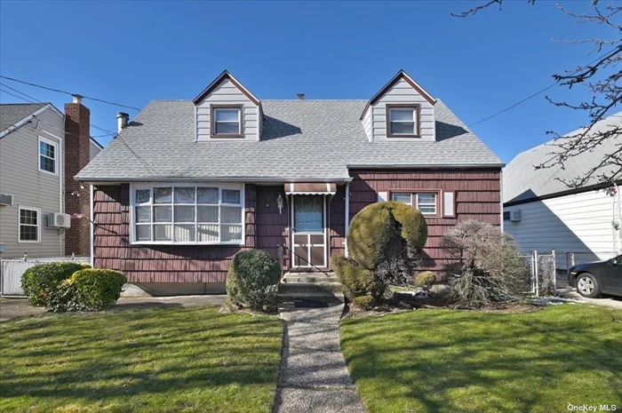 New To Market! Beautiful sunlit and spacious 5BR, 2BA cape home on lovely quiet residential street. Close to public transportation, shopping, & houses of worship, very large fenced in backyard. Finished basement with three rooms. Low Taxes!!!