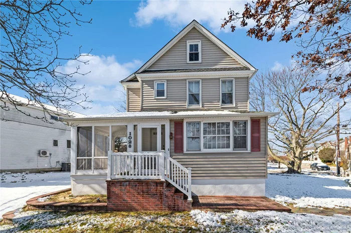 Beautiful & Spacious Sunlit 4 Bedroom Colonial In Hewlett-Woodmere School District #14. Features 2 Updated Full Baths, Gleaming Hardwood Floors, A Delightful Screened-In Porch, and A Very Large Well Maintained Property.