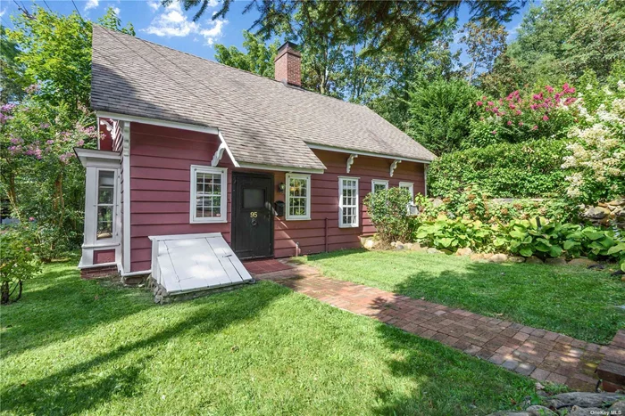 Adorable,  early American cottage nestled privately into a hillside of Roslyn&rsquo;s Historic District across the street from Roslyn Pond Park, and the charming Village of Roslyn. This precious 2 bedroom, 2 bathroom classic was hand crafted in the 17 and 1800&rsquo;s, exhibiting extraordinary, period architectural details every where you look. Surrounded by an English garden, abundantly blooming with seasonal flowers, to view as you pass through your kitchen and bedroom doors. Close to the historic Village of Roslyn! Your morning coffee and fresh baked bread 1 minute away. The vibrant culinary scene boasting many of Long Island&rsquo;s finest restaurants, as well as boutiques, galleries, shops and services. Experience Roslyn Pond Park directly across the street, with its library, playground and scenic beauty changing with every season, if not everyday. This home and setting have the feel of a quaint, New England town but with all the luxury and convenience of Long Islands famed Gold Coast. Furnished or Unfurnished. The Barn out back is available separately for rent.