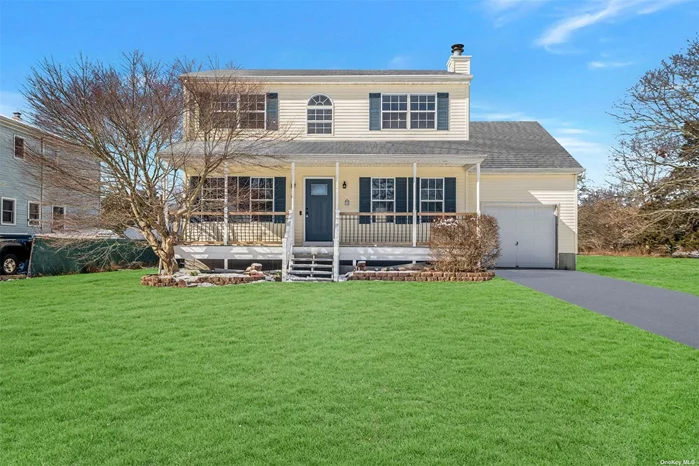 Beautiful Colonial Features Formal Living Room with Fireplace, Formal Dining Room, EIK with Updated Appliances, 1.5 Baths, Whole House Freshly Painted, 1 Car Attached Garage with Interior Access, Covered Porch and More! Moments to Smith Point Park, Beaches, Boating and More!