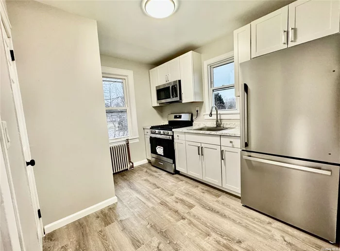 Newly renovated second floor apartment near downtown Kings Park. Use of basement for storage at tenants risk. No use of backyard.