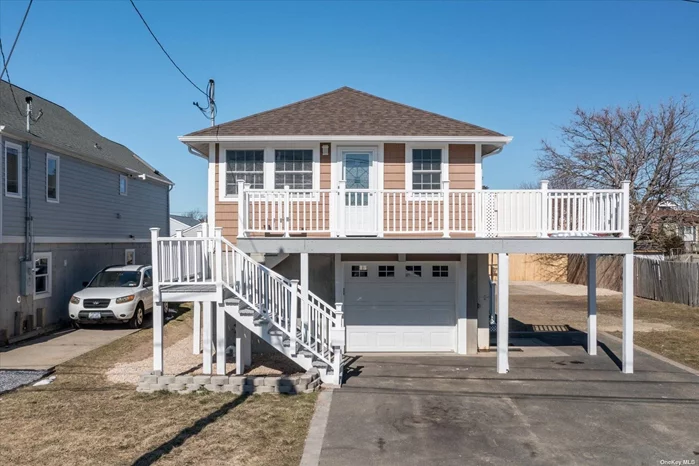 Raised Ranch to FEMA specs. Dramatic Water Views from House & Large Deck! New Kitchen with Quartz Countertops. Freshly Painted. Move in Ready! Great Value!