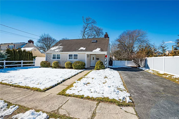 This updated cape is bright and beautiful. Working fireplace, stainless steel kitchen. Three big bedrooms and an open concept livingroom and eating area Two bathrooms and great closet space