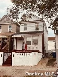 2 Family just footsteps away from the A train. This property features 4 bedrooms, 4 full baths, 2 kitchens and a full finished basement with 2 outside entrances. Close to all amenities.
