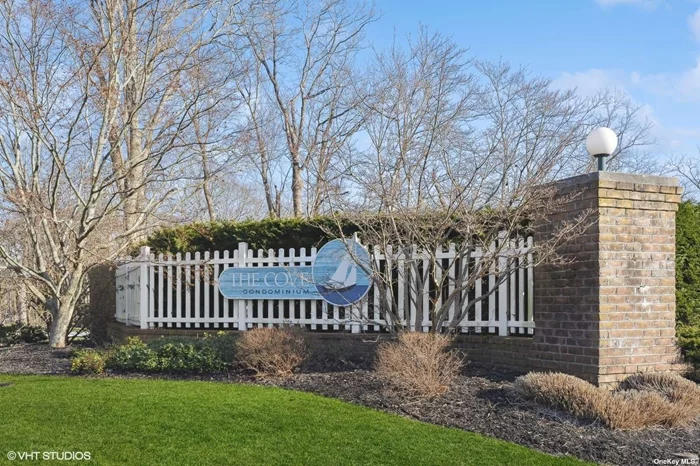 The heart of Southold now offers this luxury light filled end unit tucked away in The Cove community with direct water access so convenient for paddle boarding, kayaking, and boating. Private marina for your boat to cruise the Peconic Bay. Just cross the street to enjoy the in-ground pool, tennis, and Pickleball. With 3 bedrooms including a first floor primary suite. Primary suite includes sliders to private deck and full bath with dual sinks and jacuzzi tub. and a spacious living room with wood burning fireplace. The eat-in kitchen has been tastefully updated with white cabinetry, granite counters,  subway tile backsplash, and sliding French doors. Front and rear decks offer plenty of space for outdoor enjoyment. So much storage in the basement with a workshop, laundry area, and access to the one car garage. The home will be sold almost fully furnished so just bring your suitcase and be in for Summer 2024! Grab this rare opportunity as these units do not come available often and live your best life on the North Fork, close to farms, breweries, wineries, and incredible beaches just moments away!
