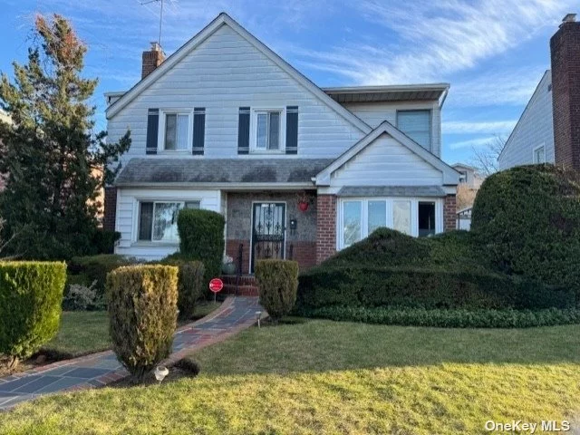 ONE of a kind house with 5 bed 3, 5 bath with huge eating kitchen side entrance going to full finished basement large backyard and driveway for 3-4 cars. House is steps to school, park, shopping LLR, and express trains and buses!!